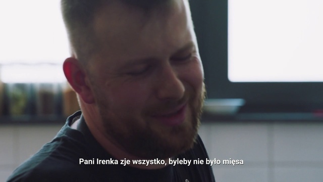 Video Reference N2: Face, Facial expression, Chin, Forehead, Cheek, Nose, Head, Neck, Jaw, Mouth, Person, Man, Indoor, Looking, Front, Holding, Sitting, Laptop, Food, Screen, Computer, Smiling, Glasses, Standing, Table, Shirt, Young, Phone, Woman, Human face, Screenshot, Selfie, Smile, Staring