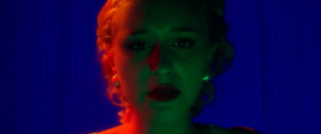 Video Reference N4: red, green, organism, mouth, neon, performance, art, darkness, Person