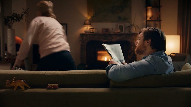 Video Reference N1: furniture, lighting, darkness, girl, electronic device, conversation, night, couch, table