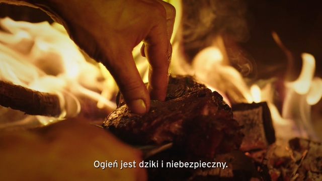 Video Reference N1: Heat, Flame, Hand, Fire, Cuisine, Person, Cake, Indoor, Nature, Chocolate, Table, Piece, Food, Sitting, Man, Fireplace, Cutting, Close, Cut, Birthday, Plate, Eating, Pan