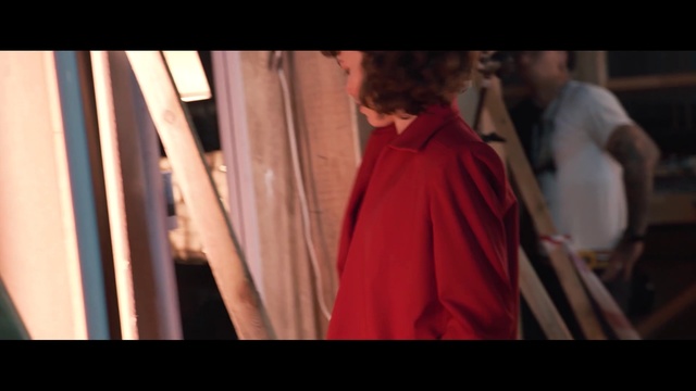 Video Reference N1: Red, Shoulder, Fashion, Arm, Dress, Joint, Music, Outerwear, Scene, Human body