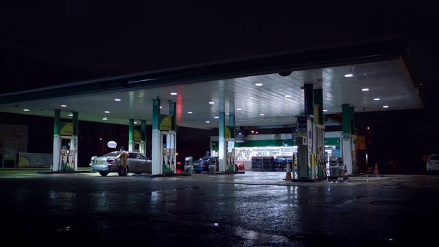 Video Reference N0: Night, Building, Filling station, Metropolitan area, Architecture, Darkness, City, Gasoline, Midnight, Business