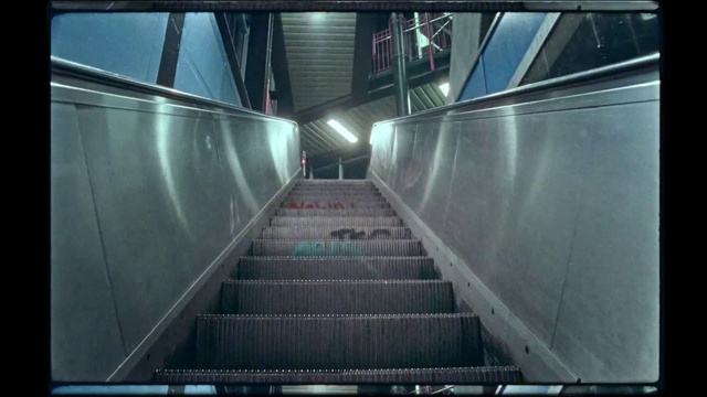 Video Reference N1: Escalator, Stairs, Building, Fixture, Parallel, Gas, Engineering, Symmetry, City, Metal