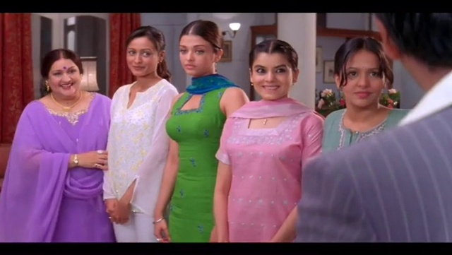 Video Reference N1: Face, Smile, Shoulder, One-piece garment, Purple, Happy, Dress, Pink, Fashion design, Formal wear