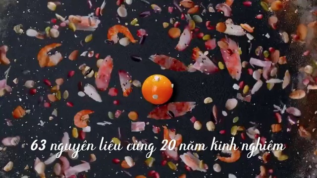 Video Reference N4: Textile, Orange, Organism, Confetti, Font, Fish, Event, Crowd, Party supply, Pattern