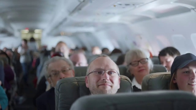 Video Reference N2: Glasses, Vision care, Air travel, Eyewear, Aircraft cabin, Airplane, Passenger, Crowd, Event, Vehicle