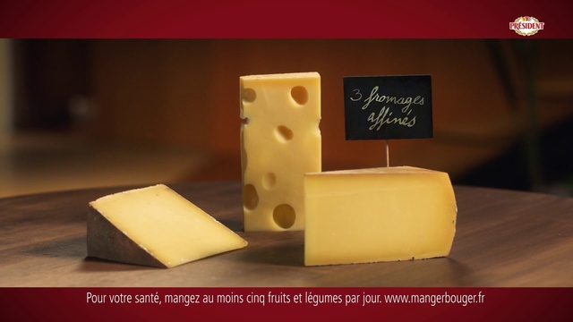 Video Reference N1: Wood, Rectangle, Processed cheese, Gruyère cheese, Swiss cheese, Ingredient, Font, Art, Toy, Sweetness