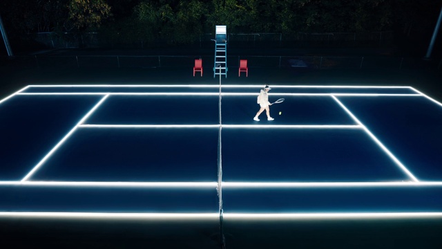 Video Reference N4: Racquet sport, Asphalt, Rectangle, Tennis court, Player, Symmetry, Font, Electric blue, Flooring, Sports equipment
