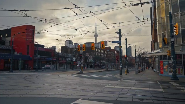 Video Reference N4: Cloud, Sky, Building, Daytime, Road surface, Electricity, Asphalt, Residential area, Overhead power line, Dusk