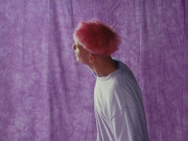 Video Reference N4: Purple, Sleeve, Violet, Pink, Headgear, Magenta, Electric blue, T-shirt, Event, Street fashion