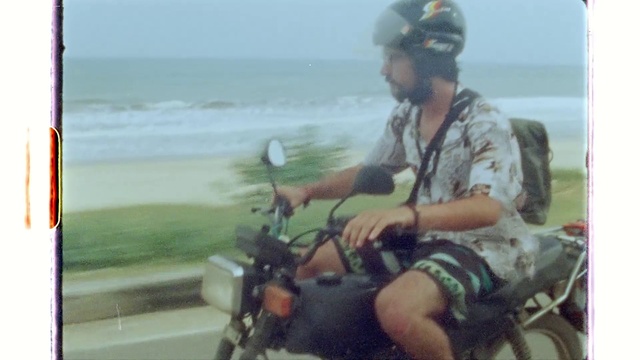 Video Reference N1: Water, Sky, Motor vehicle, Helmet, Vehicle, Motorcycle, Bicycle handlebar, Automotive tire, Travel, Beach