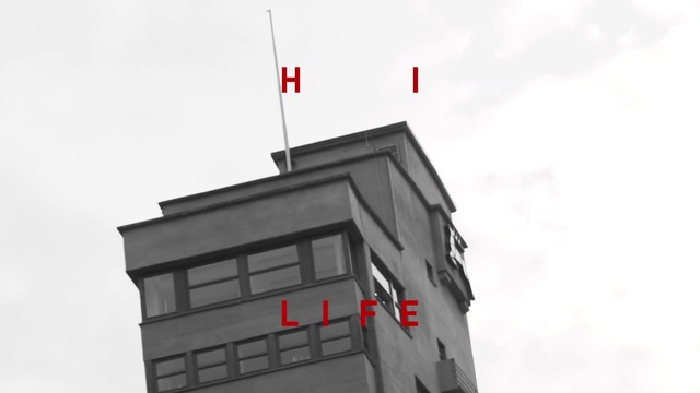 Video Reference N4: Building, Sky, Window, Cloud, Flag, Tower, Grey, Facade, Slope, Rectangle