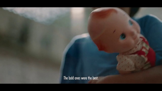 Video Reference N3: Gesture, Doll, Toy, Happy, Flash photography, Font, Thumb, Peach, Stuffed toy, Fictional character