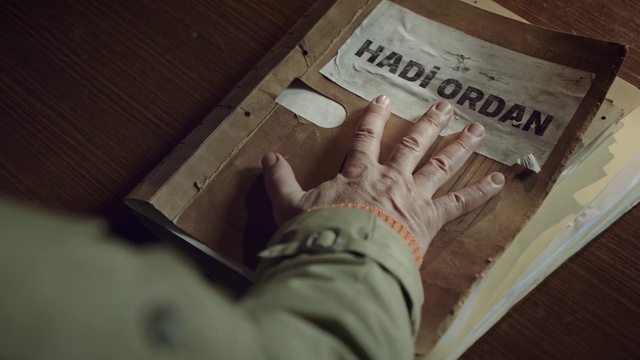 Video Reference N2: Wood, Gesture, Finger, Publication, Thumb, Nail, Wrist, Font, T-shirt, Flooring