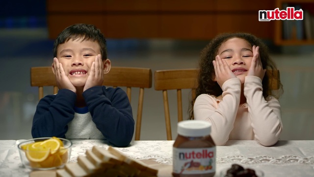 Video Reference N3: Face, Organ, Smile, Happy, Sharing, Yellow, Table, Interaction, Tableware, Citrus