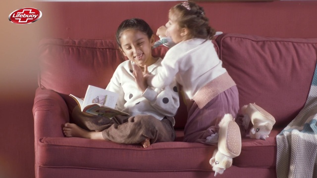 Video Reference N1: Comfort, Smile, Happy, Lap, Fun, Event, Toddler, Couch, Sitting, Knee