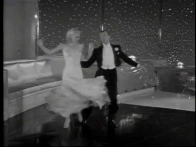 Video Reference N17: Leg, Dance, Flash photography, Dress, Performing arts, Standing, Gesture, Black-and-white, Style, Entertainment
