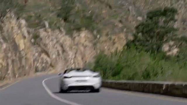 Video Reference N1: Vehicle, Car, Automotive design, Asphalt, Automotive exterior, Personal luxury car, Road surface, Road, Racing, Rolling