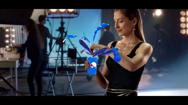 Video Reference N1: Microphone, Sheath dress, Smile, Musical instrument, Flash photography, Entertainment, Gesture, Dress, Performing arts, Music artist