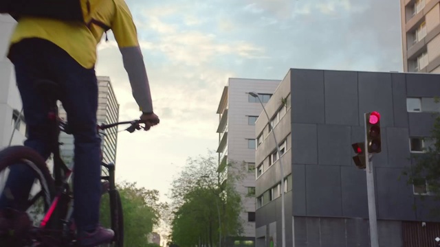 Video Reference N4: Cloud, Sky, Building, Tree, Plant, Rolling, Tower block, Asphalt, Bicycle tire, City