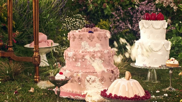 Video Reference N6: Food, Plant, Cake decorating, Cake decorating supply, Cake, Ingredient, Petal, Flower, Orange, Wedding cake