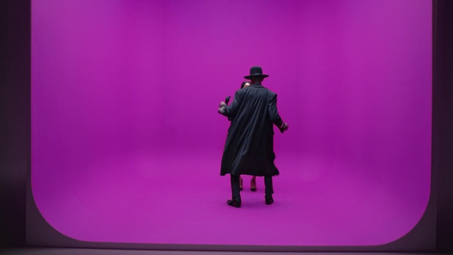 Video Reference N1: Outerwear, Purple, Sleeve, Violet, Pink, Rectangle, Magenta, Font, Performing arts, Frock coat