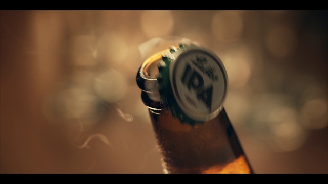 Video Reference N2: Liquid, Bottle cap, Water, Flash photography, Fluid, Beer, Glass bottle, Font, Drinkware, Gas