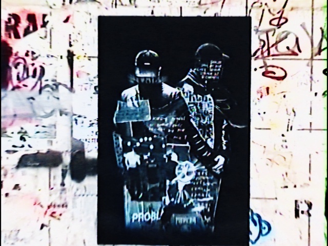 Video Reference N0: Black, Sleeve, Rectangle, Font, Gesture, Art, Wall, Graffiti, T-shirt, Poster