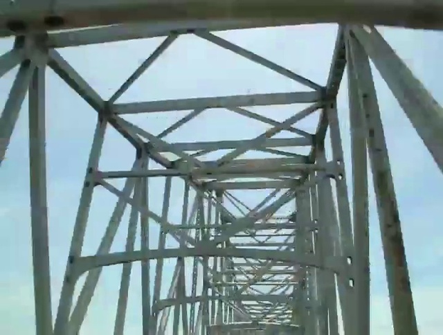 Video Reference N1: Sky, Cloud, Beam, Girder bridge, Truss bridge, Electricity, Engineering, Bridge, Symmetry, Public utility