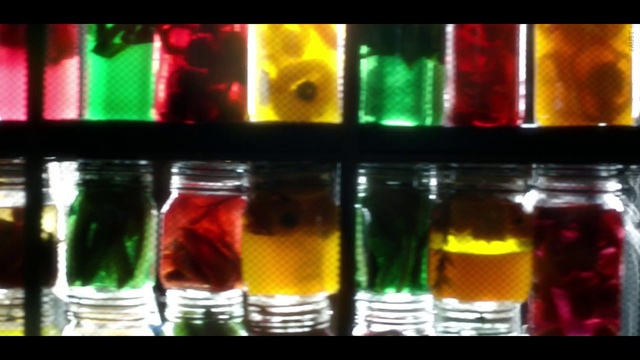 Video Reference N0: Drinkware, Liquid, Automotive lighting, Glass bottle, Fluid, Amber, Barware, Rectangle, Ingredient, Solution