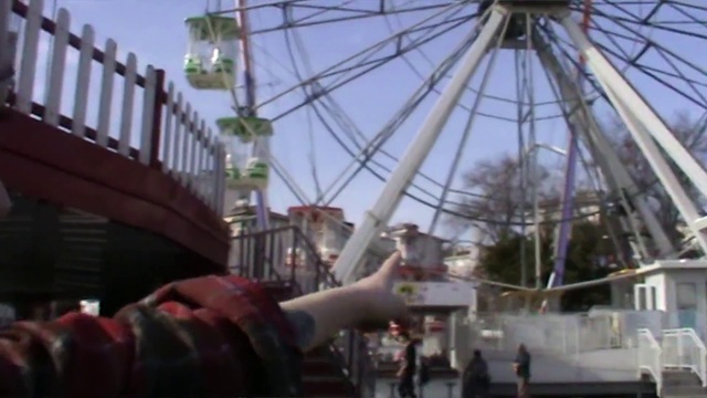 Video Reference N20: Sky, Ferris wheel, Outdoor recreation, Leisure, Recreation, Fun, Landmark, Amusement ride, Event, Automotive wheel system
