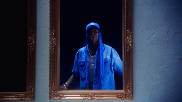 Video Reference N3: Blue, Rain suit, Sleeve, Purple, Electric blue, Wood, Cap, Magenta, Street fashion, Rectangle