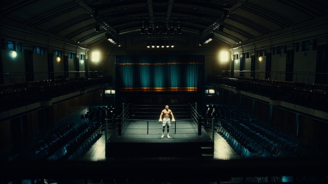 Video Reference N1: Field house, Chair, Entertainment, Stage, Symmetry, Performing arts, Event, Performing arts center, Darkness, Hall
