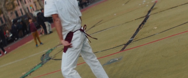Video Reference N14: Dobok, Martial arts uniform, Martial arts, Sports uniform, Sports equipment, Flooring, Floor, Competition event, Player, Knee