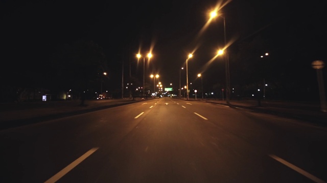 Video Reference N7: Brown, Street light, Automotive lighting, Road surface, Electricity, Asphalt, Amber, Sky, Thoroughfare, Midnight