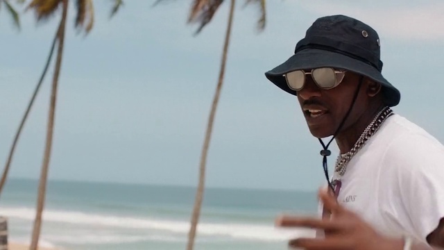 Video Reference N13: Water, Sky, Sunglasses, Goggles, Cap, Body of water, Eyewear, Travel, Baseball cap, People on beach
