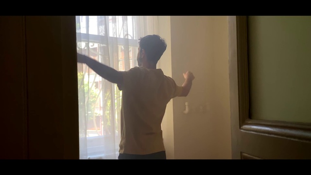 Video Reference N0: Window, Sleeve, Gesture, Sunlight, Tints and shades, Wood, Curtain, Elbow, T-shirt, Backlighting