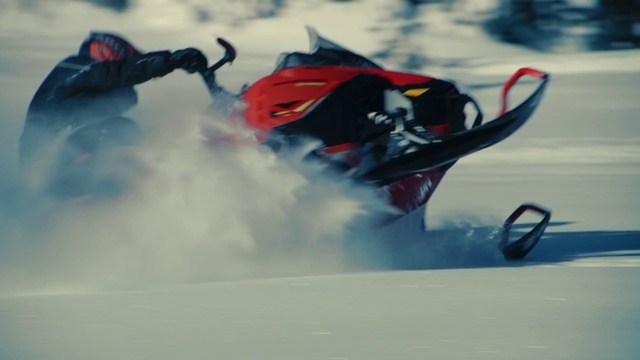 Video Reference N3: Snowmobile, Vehicle, Helmet, Sports equipment, Automotive tire, Snow, Automotive design, Outdoor recreation, Motorsport, Sled