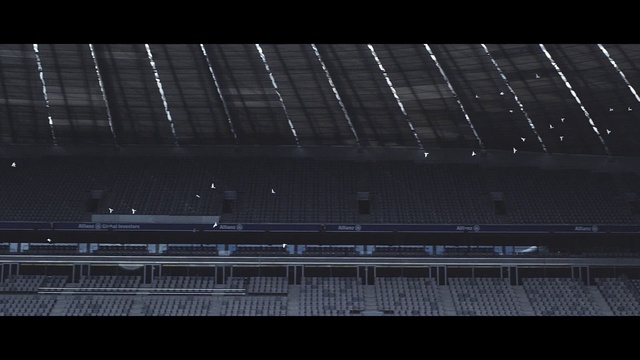 Video Reference N7: Automotive lighting, Grille, Automotive design, Font, Rectangle, Parallel, City, Sport venue, Audio equipment, Darkness