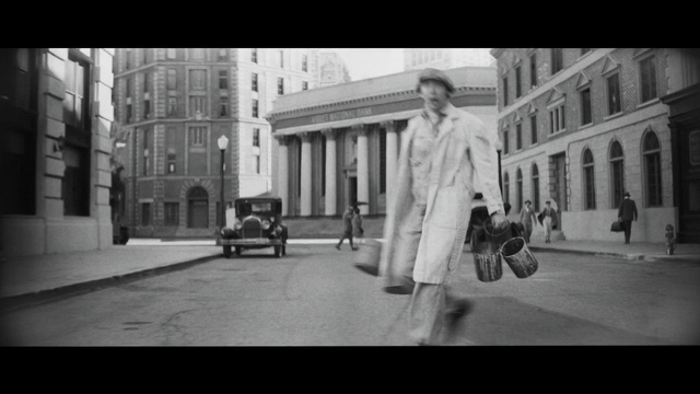 Video Reference N8: Building, White, Vehicle, Tire, Window, Black, Standing, Black-and-white, Street fashion, Car