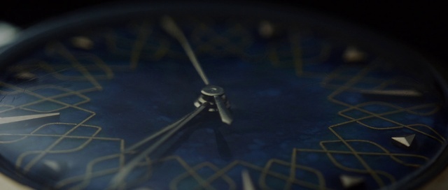 Video Reference N4: Clock, Font, Electric blue, Circle, Terrestrial plant, Symmetry, Natural material, Arthropod, Macro photography, Darkness