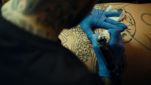Video Reference N6: Hand, Art, Wrist, Nail, Microphone, Tints and shades, Electric blue, Human leg, Tattoo, Entertainment