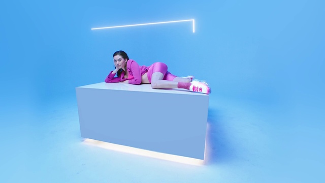 Video Reference N9: Art, Magenta, Electric blue, Leisure, Toy, Fun, Automotive design, Event, Sitting, Room