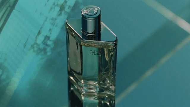 Video Reference N2: Liquid, Perfume, Bottle, Fluid, Drinkware, Aqua, Glass bottle, Art, Electric blue, Solvent