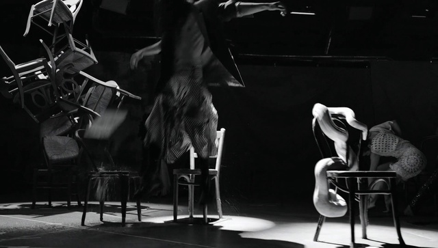 Video Reference N3: Shoe, White, Black, Musician, Chair, Performing arts, Lighting, Entertainment, Black-and-white, Style