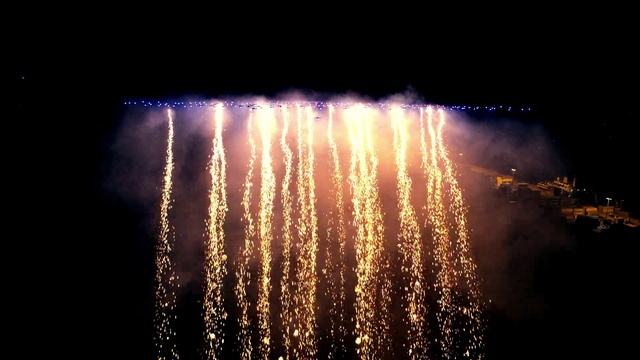 Video Reference N22: Water, Fireworks, Sky, Entertainment, Celebrating, Recreation, Midnight, Font, Event, Holiday