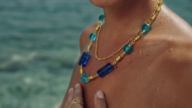 Video Reference N0: Water, Body jewelry, Neck, Sunglasses, Finger, Necklace, Chest, Eyewear, Wrist, Trunk