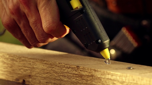 Video Reference N1: Wood, Gesture, Table, Hardwood, Wood stain, Nail, Thumb, Desk, Plank, Font