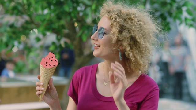 Video Reference N1: Glasses, Hand, Smile, Facial expression, Vision care, Green, Sunglasses, Happy, Ice cream cone, Eyewear