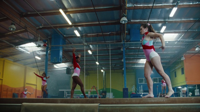 Video Reference N2: Leotard, Maillot, Swimwear, Field house, Entertainment, Thigh, Swimming pool, Shorts, Building, Performing arts
